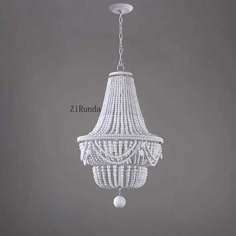 ثريا خشبية مزينة بالخرز شبه مد - مراجعة Baby Nursery Chandelier وسعره